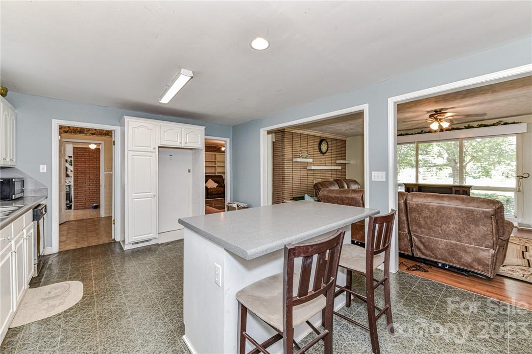 6308 Indian Trail Fairview Road Hemby Bridge, NC 28079 - Photo 15 of 36 a living room with furniture and a table