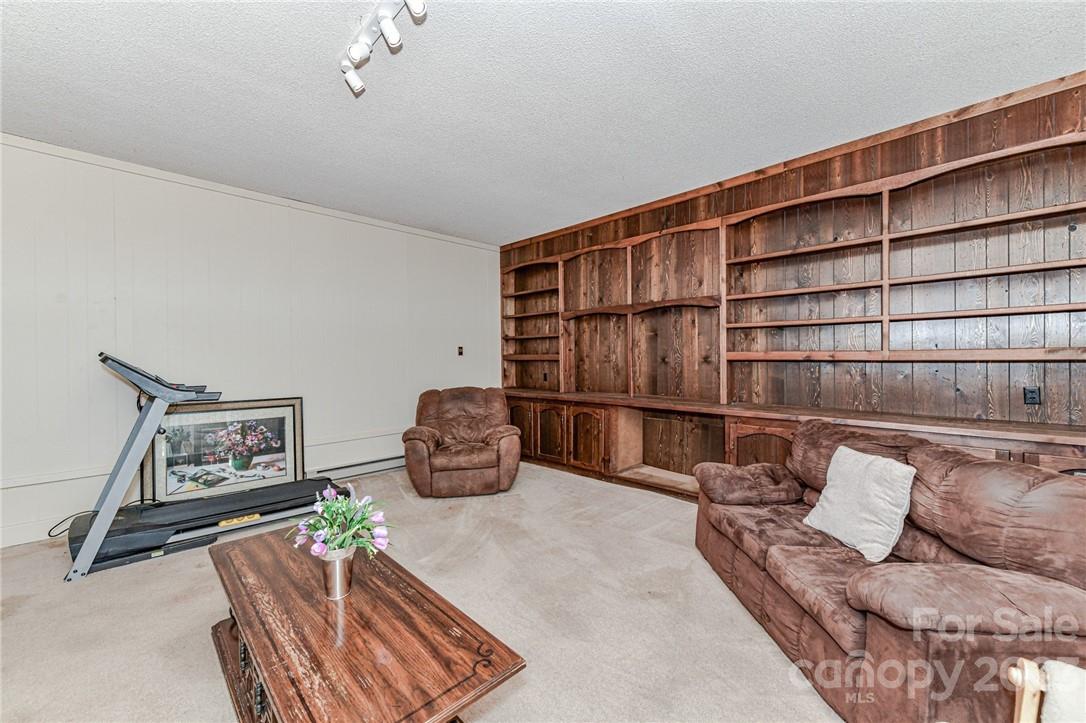 6308 Indian Trail Fairview Road Hemby Bridge, NC 28079 - Photo 22 of 36 a living room with furniture