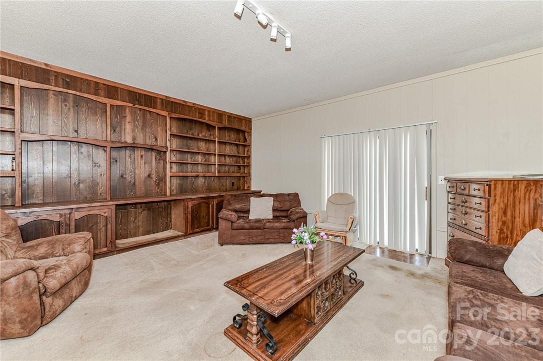 6308 Indian Trail Fairview Road Hemby Bridge, NC 28079 - Photo 23 of 36 a living room with furniture
