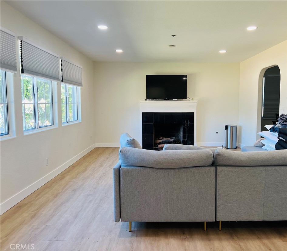 405 Fifth Avenue Arcadia, CA 91006 - Photo 6 of 18 a living room with furniture and a fireplace
