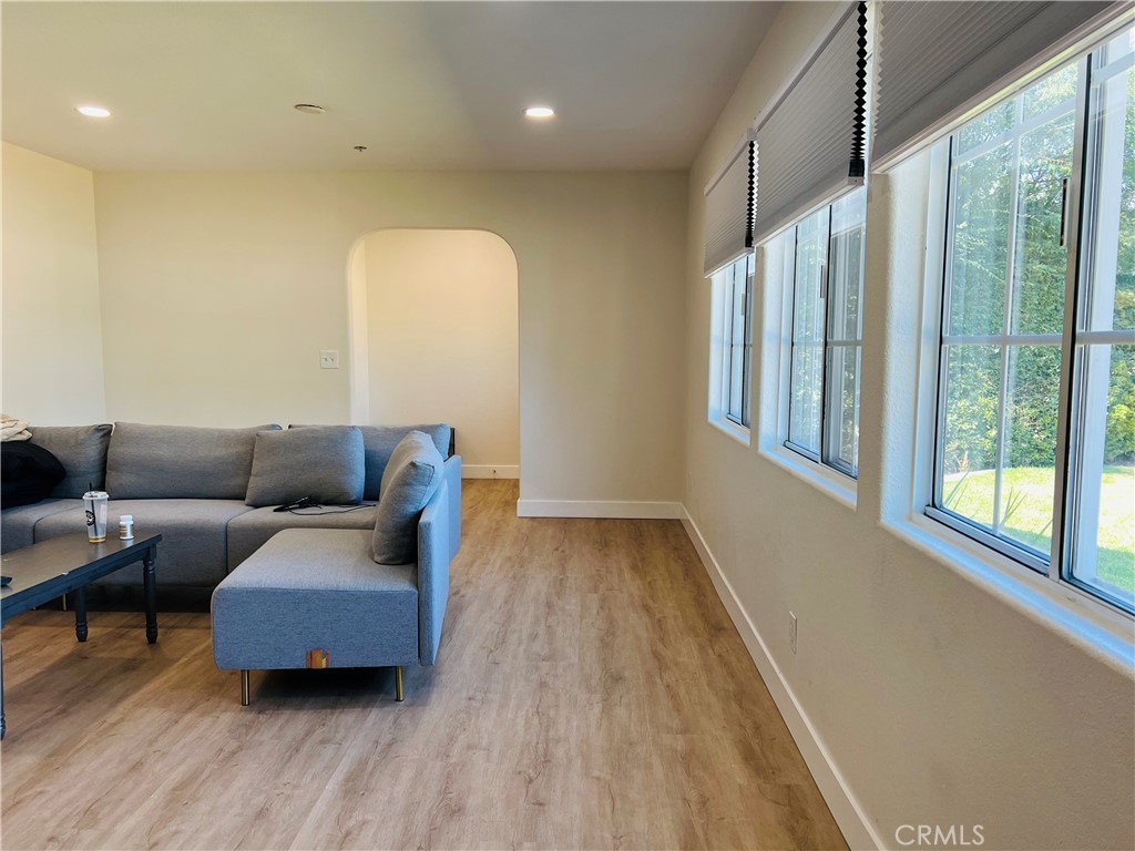 405 Fifth Avenue Arcadia, CA 91006 - Photo 7 of 18 a living room with furniture and a large window