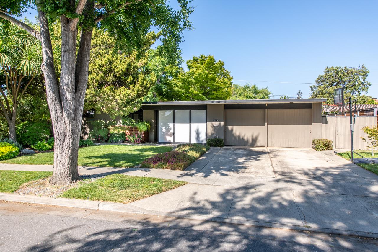 1976 Adele Place San Jose, CA 95125 - Photo 3 of 38 a front view of a house with a yard and garage