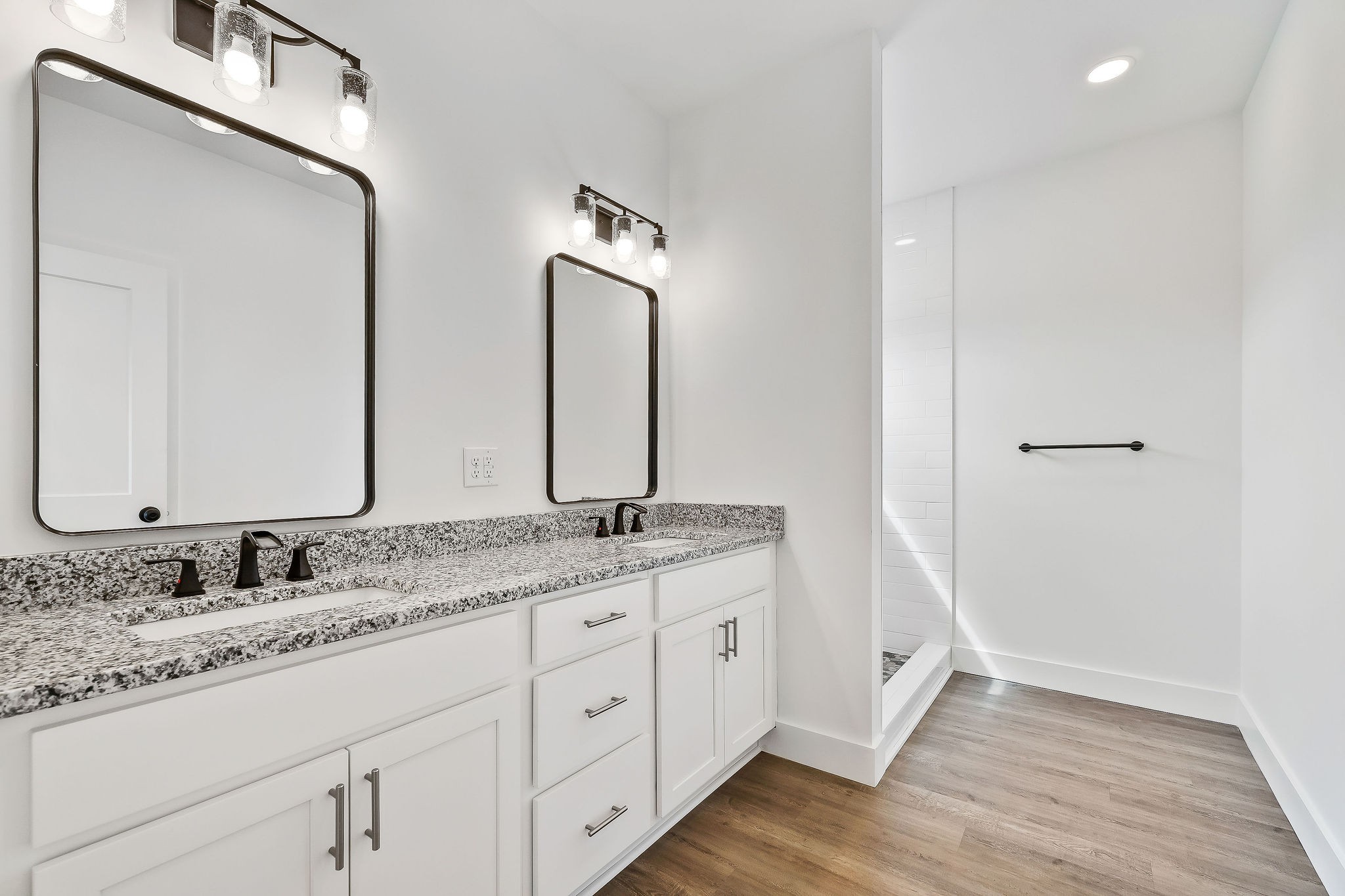 320 Johnson Chapel Road Sparta, TN 38583 - Photo 27 of 35 a bathroom with a granite countertop sink double and mirror