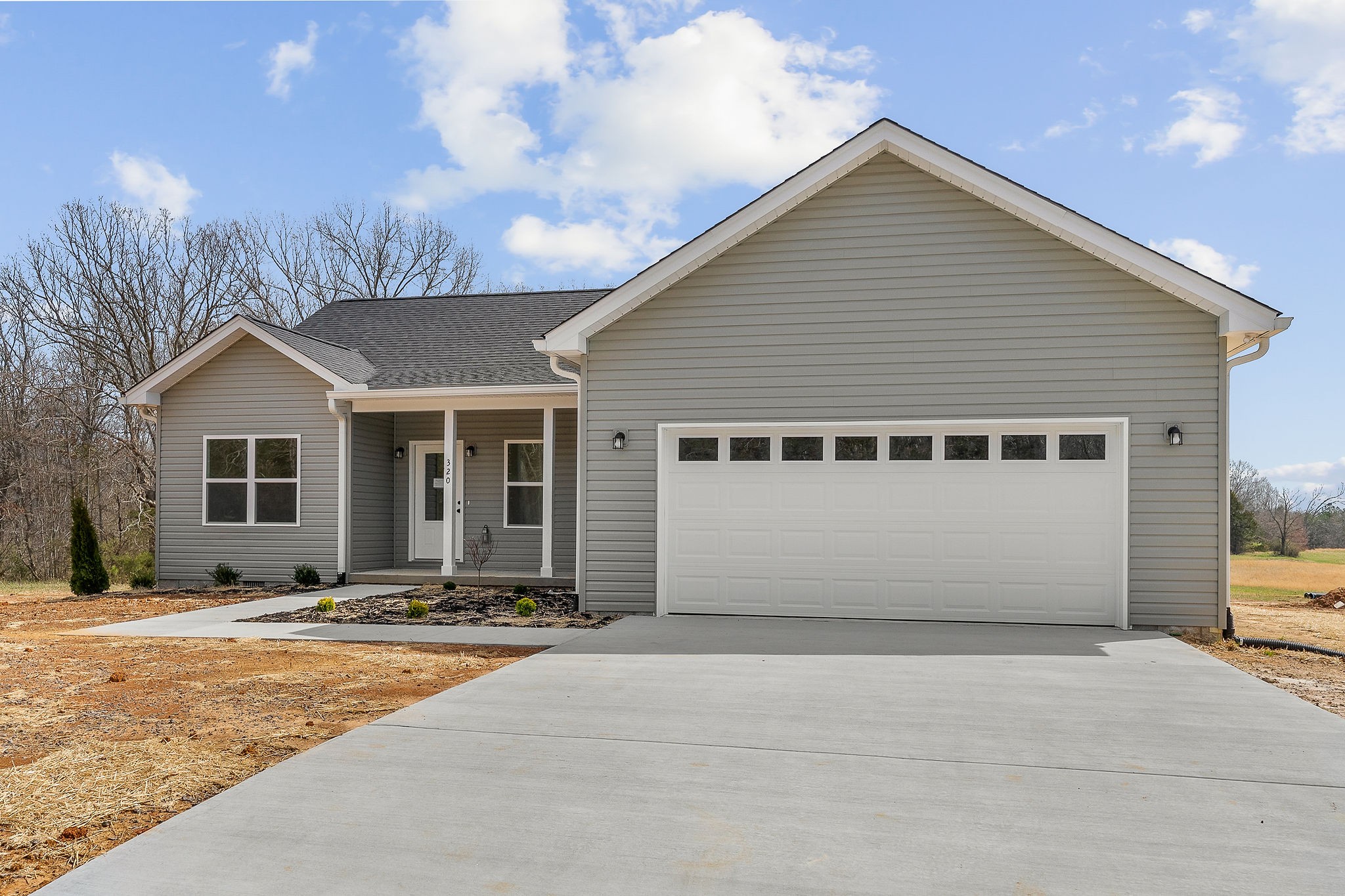 320 Johnson Chapel Road Sparta, TN 38583 - Photo 3 of 35 a front view of a house with a yard