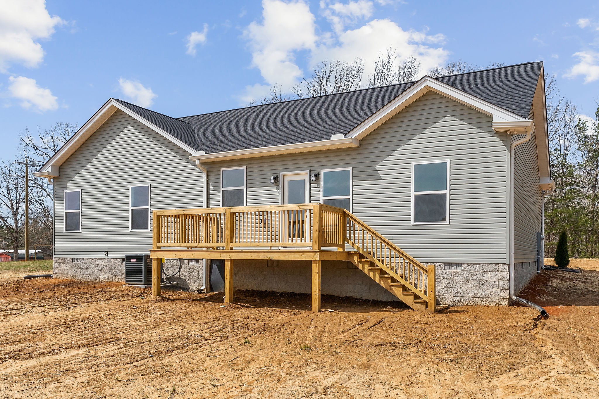 320 Johnson Chapel Road Sparta, TN 38583 - Photo 6 of 35 a view of a house with a patio and a wooden fence