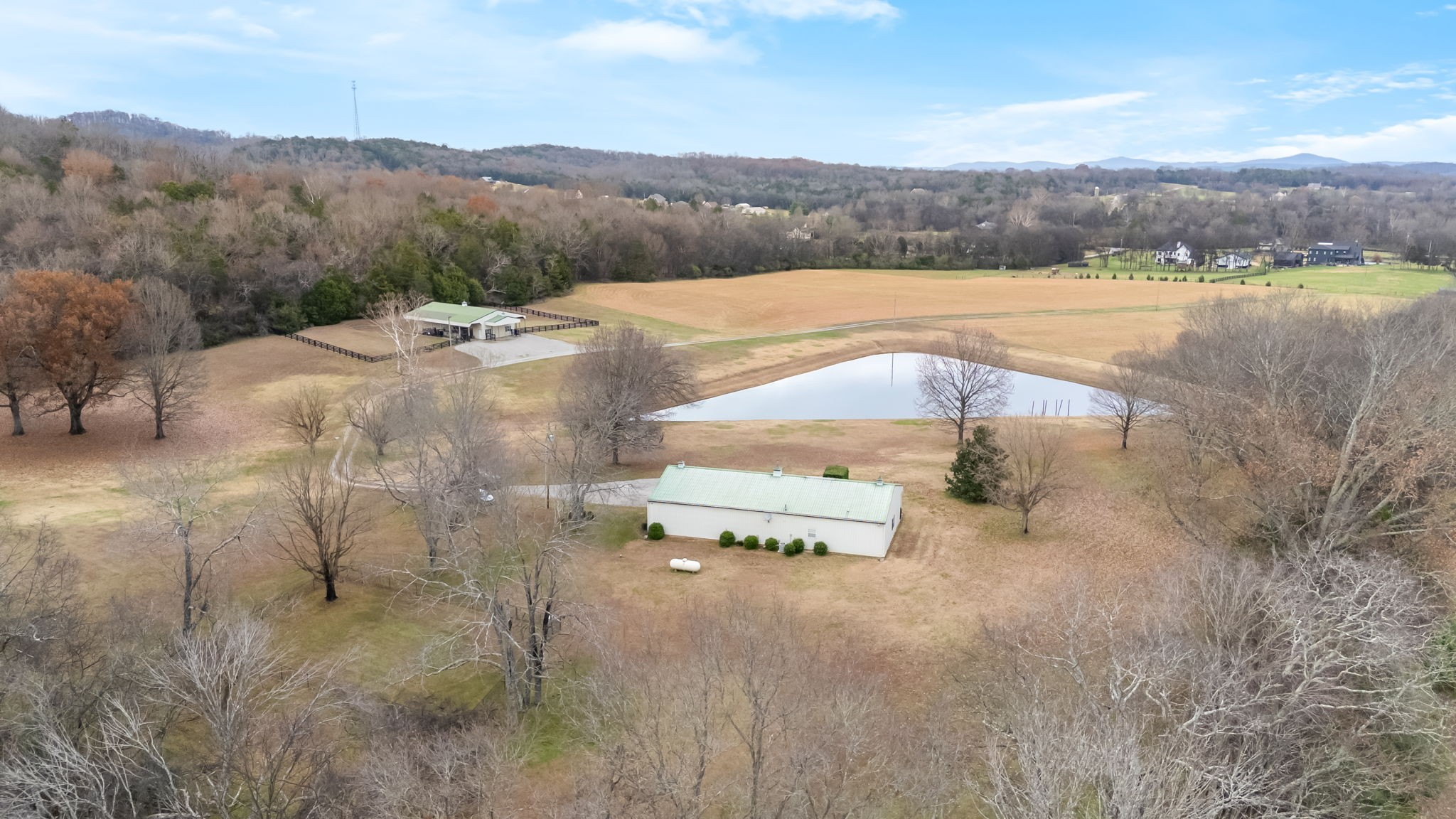 3100 Floyd Road Eagleville, TN 37060 - Photo 54 of 62 a view of a lake and mountain