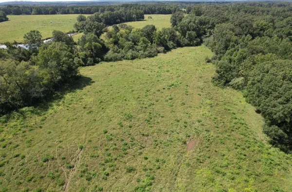 a view of a lake with a building