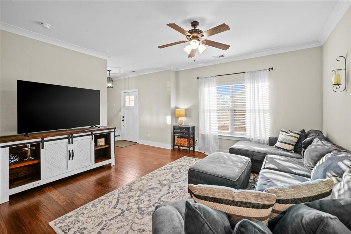 1048 Hurricane Creek Road Chattanooga, TN 37421 - Photo 3 of 31 a living room with furniture and a flat screen tv
