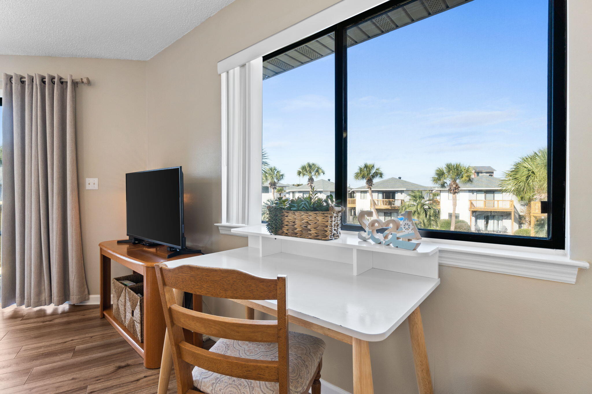 285 Payne Street, Unit 23B Miramar Beach, FL 32550 - Photo 10 of 41 a dining room with furniture and a floor to ceiling window