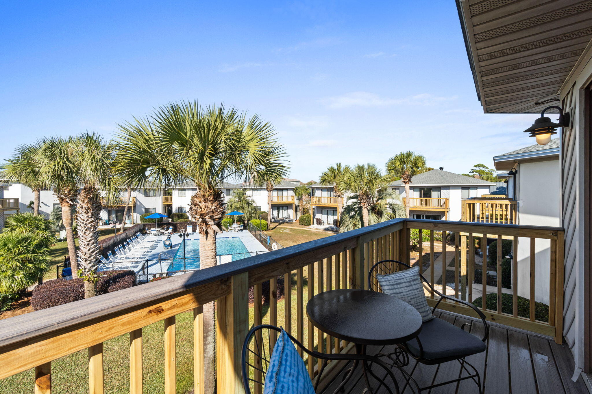 285 Payne Street, Unit 23B Miramar Beach, FL 32550 - Photo 15 of 41 a view of a balcony with chairs