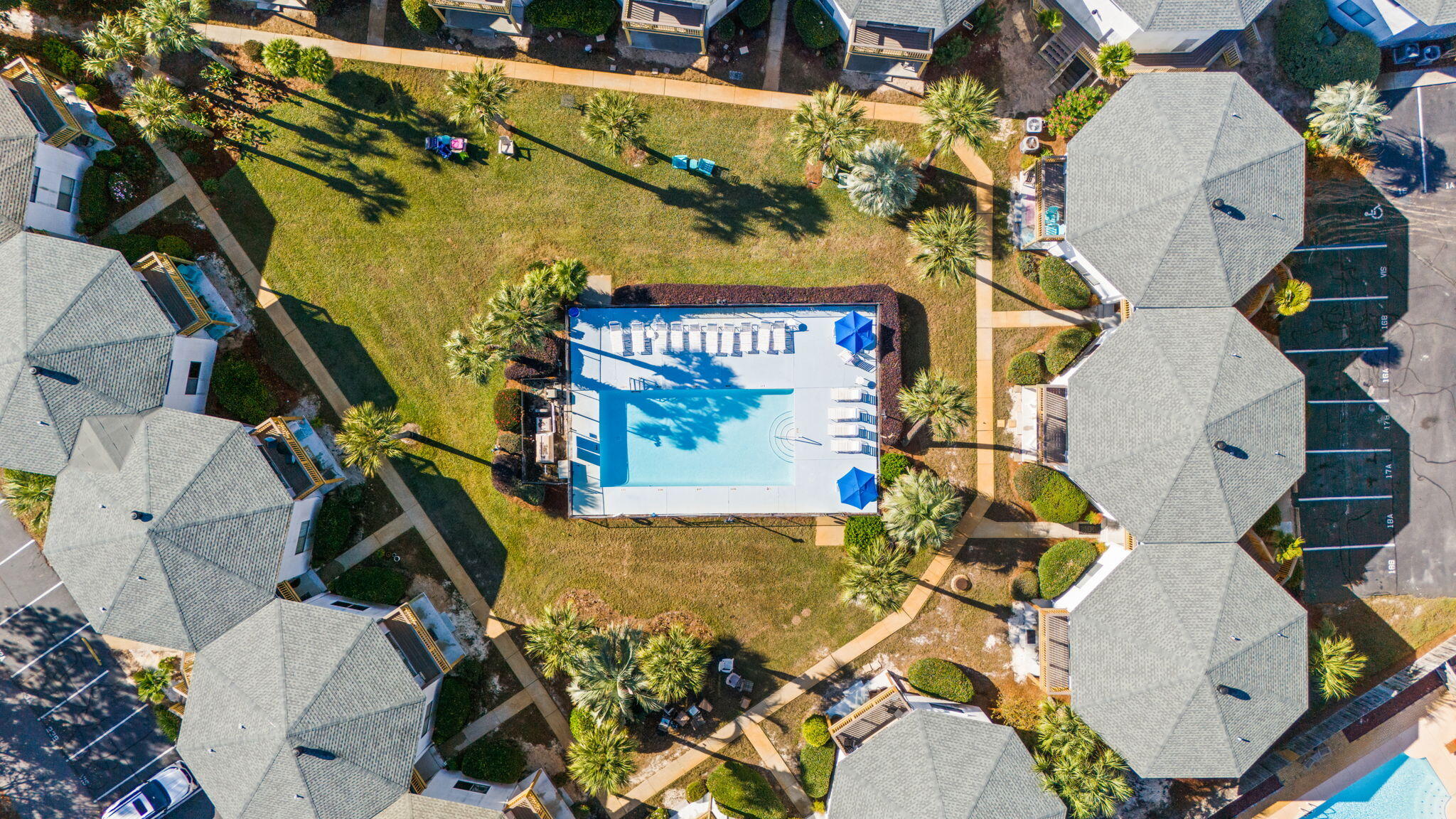285 Payne Street, Unit 23B Miramar Beach, FL 32550 - Photo 34 of 41 an aerial view of a house with swimming pool and wooden fence