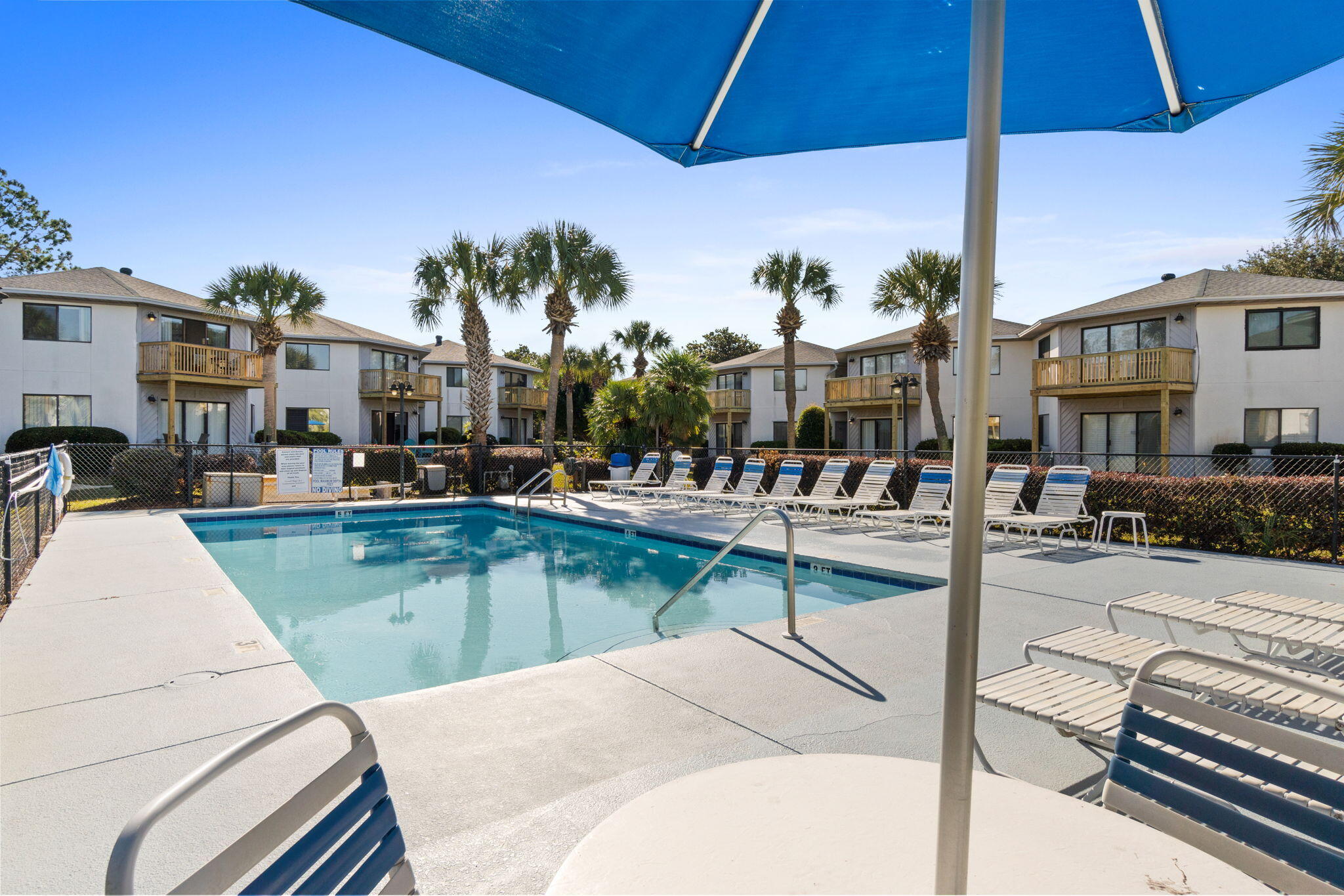 285 Payne Street, Unit 23B Miramar Beach, FL 32550 - Photo 35 of 41 a view of a swimming pool with a patio