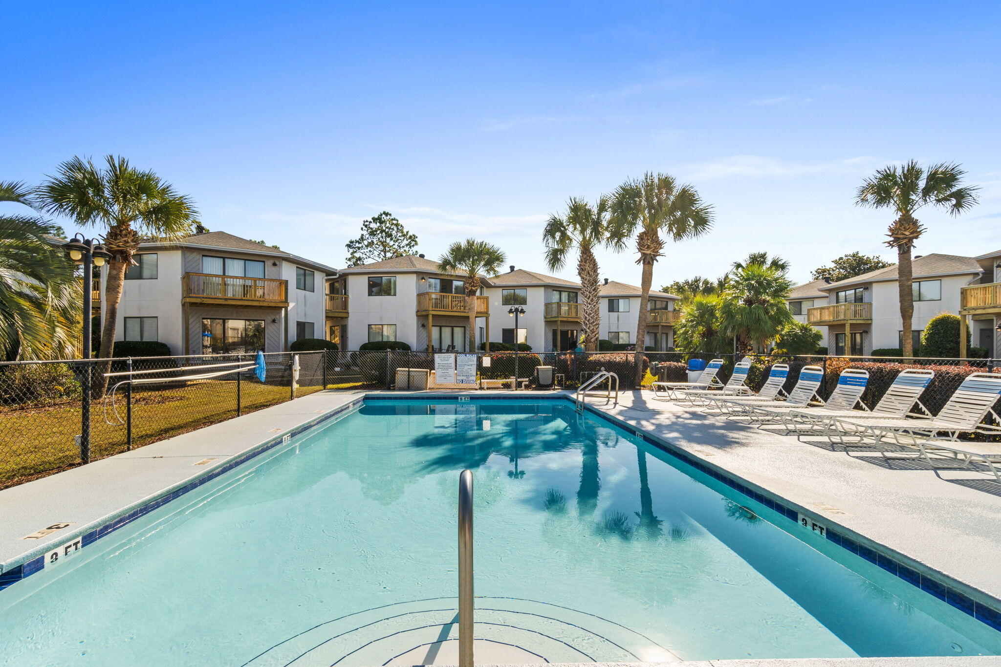 285 Payne Street, Unit 23B Miramar Beach, FL 32550 - Photo 36 of 41 a view of a swimming pool with an outdoor seating