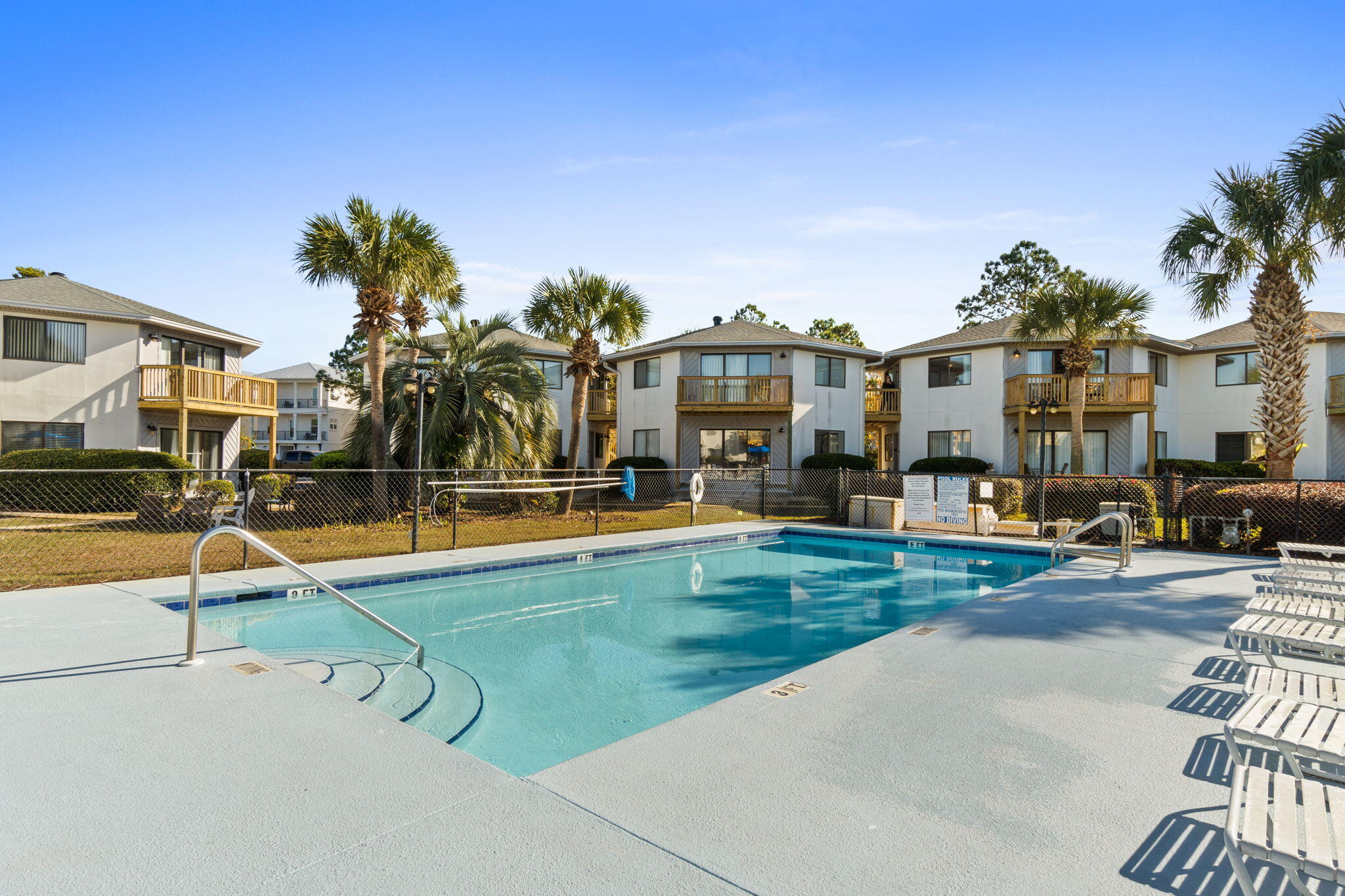 285 Payne Street, Unit 23B Miramar Beach, FL 32550 - Photo 37 of 41 a view of a house with swimming pool