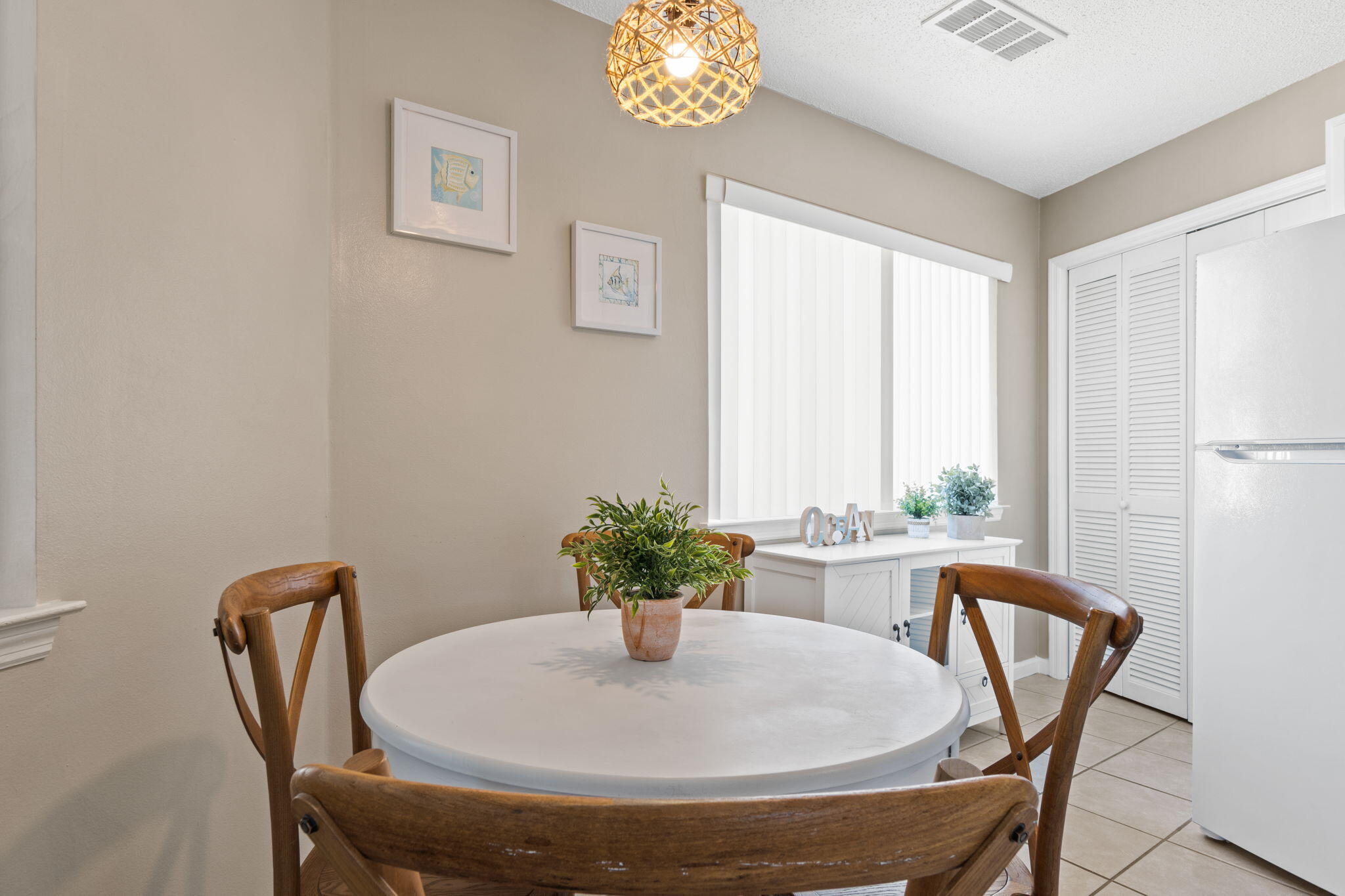 285 Payne Street, Unit 23B Miramar Beach, FL 32550 - Photo 6 of 41 a dining room with furniture and a window