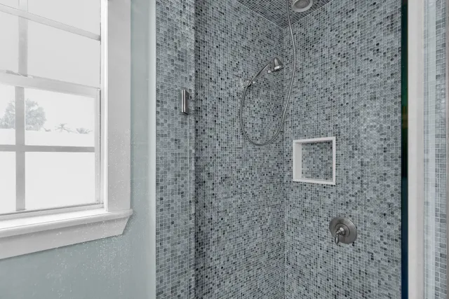 a bathroom with a shower curtain