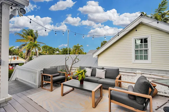 a outdoor living space with patio furniture