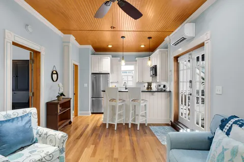 a living room with furniture and a table