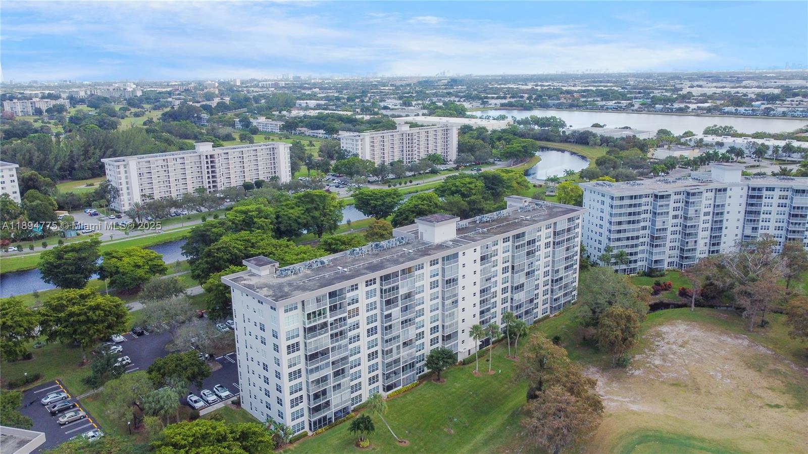 605 Oaks Drive, Unit 305 Pompano Beach, FL 33069 - Photo 31 of 31 a view of a city and mountains