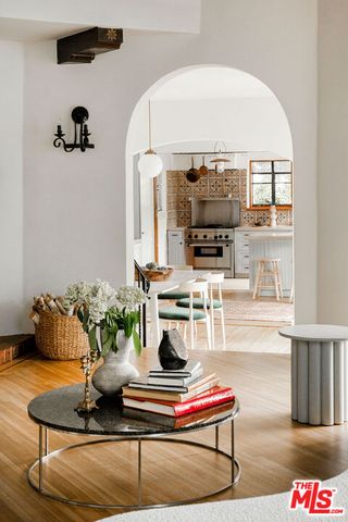 a kitchen with a stove and a microwave