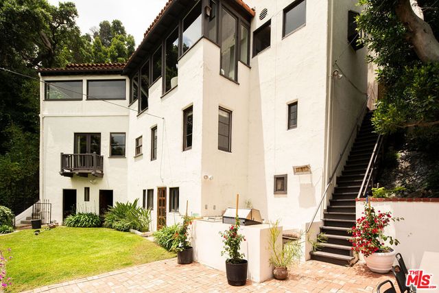 a bed room with a bed and a table