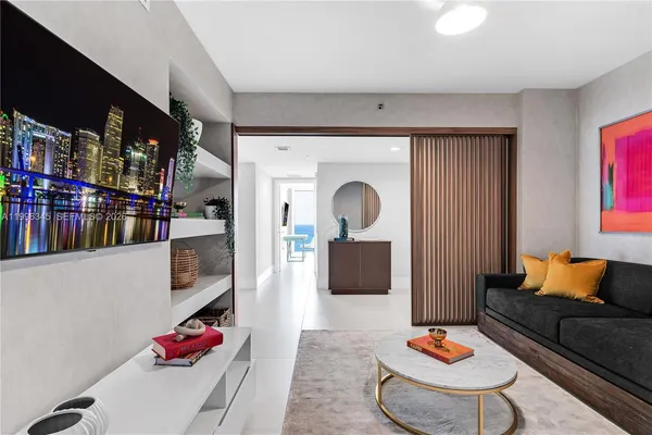 a living room with furniture and a couch