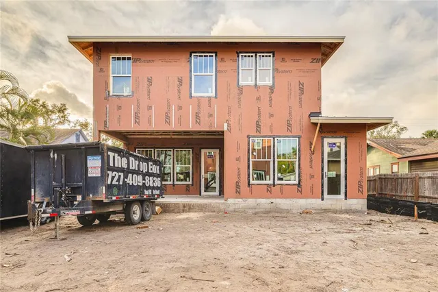 a view of a house with a large window