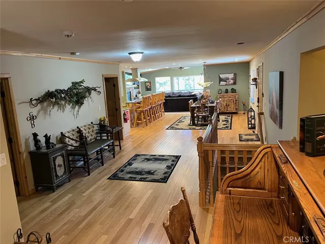 a view of a living room and dining room