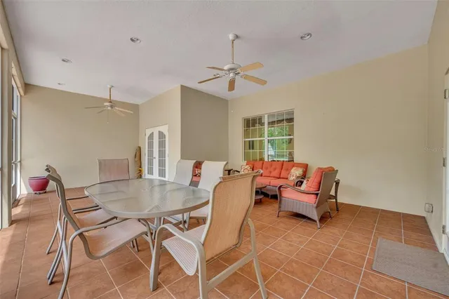 a view of a garden with a building in the background