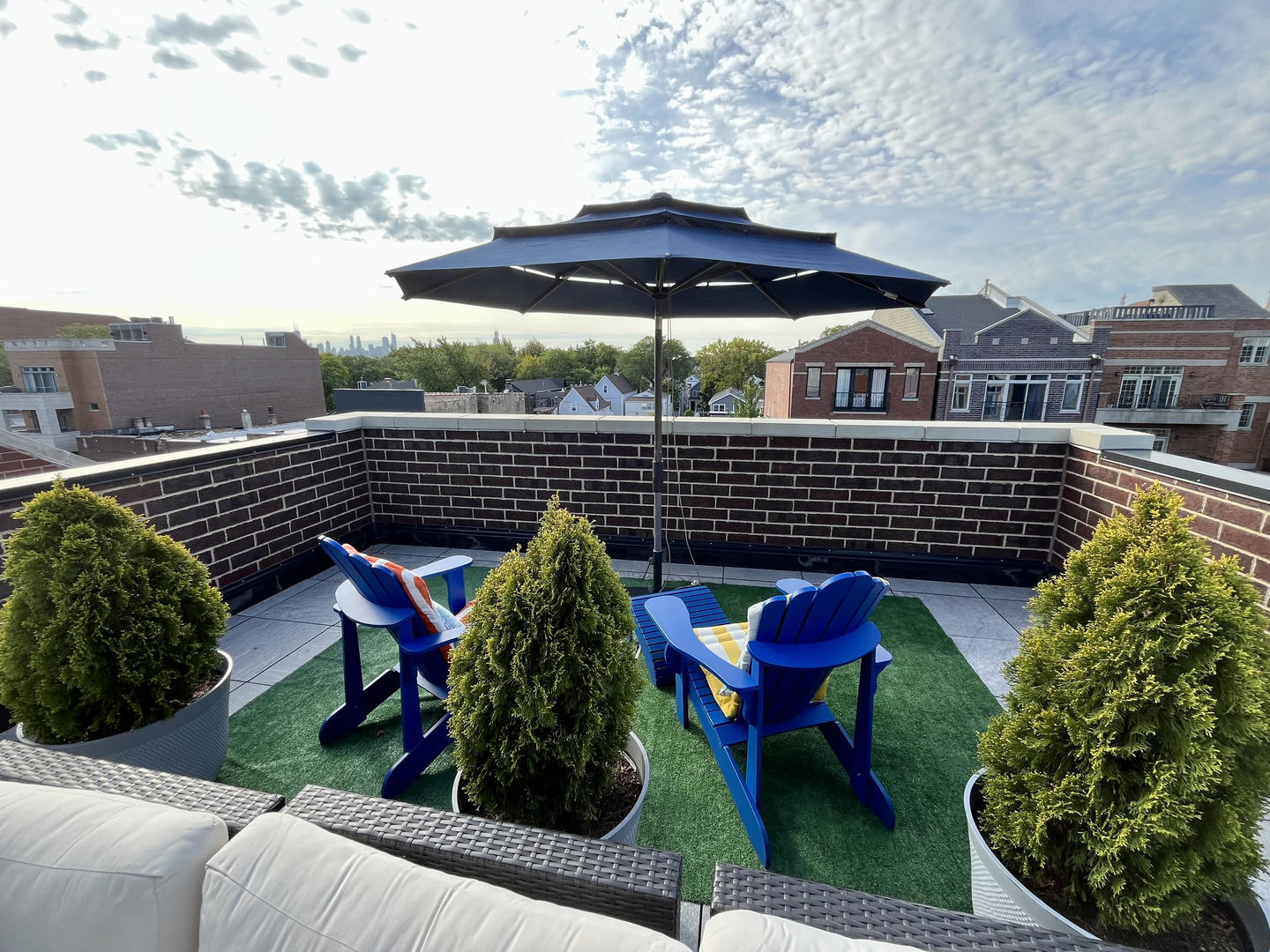 1922 West Belmont Avenue, Unit 3 Chicago, IL 60657 - Photo 4 of 29 a view of a chairs and table in the back yard of the house