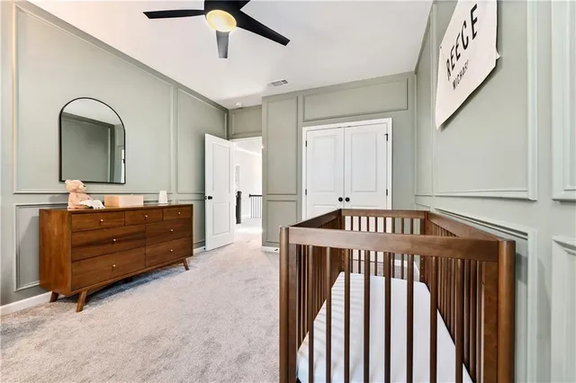 a bedroom with bed and a window