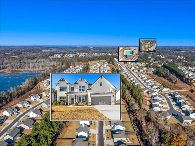 an aerial view of a house with outdoor space