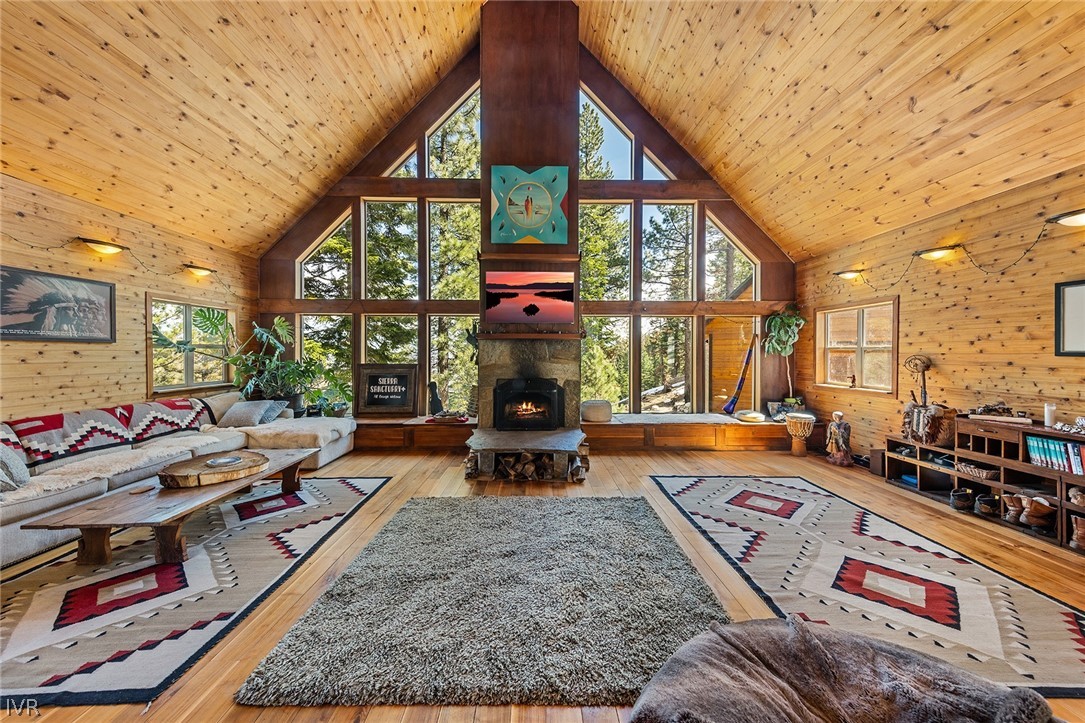 a living room filled with furniture and a chandelier