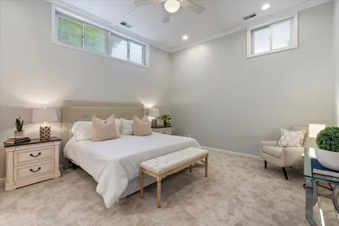a bedroom with a bed and a cabinets