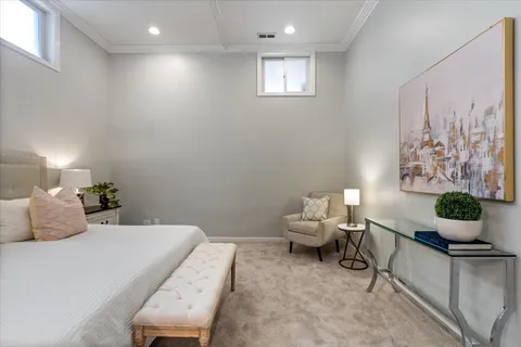 a bedroom with a bed and furniture