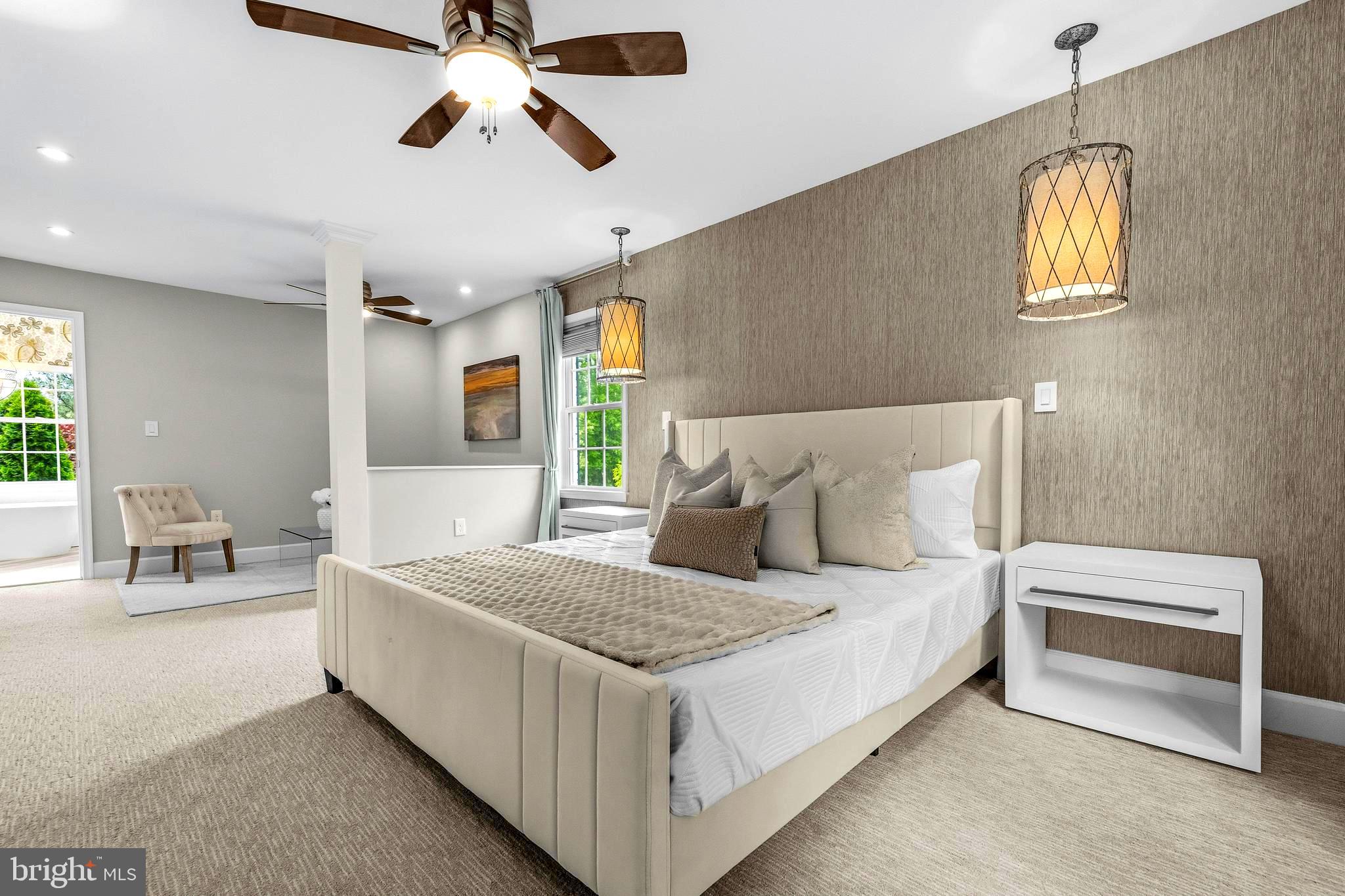 4007 West Braddock Road Alexandria, VA 22304 - Photo 22 of 52 a spacious bedroom with a bed and a chandelier