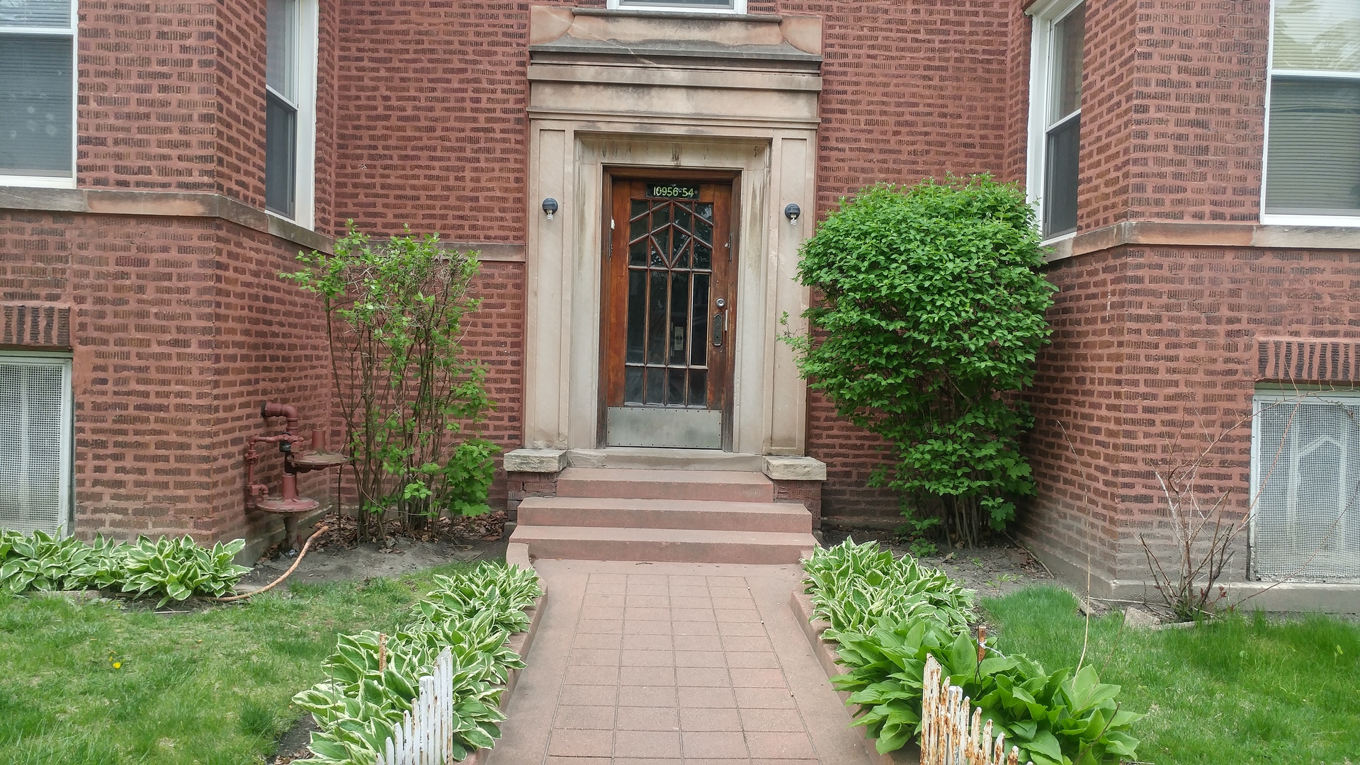416 East 110th Street, Unit 3 Chicago, IL 60628 - Photo 3 of 7 a view of the entrance of the house