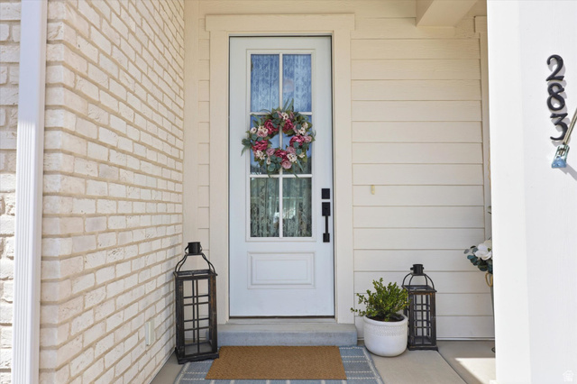 283 North 500 West Mapleton, UT 84664 - Photo 7 of 102 Doorway to property featuring brick & siding.