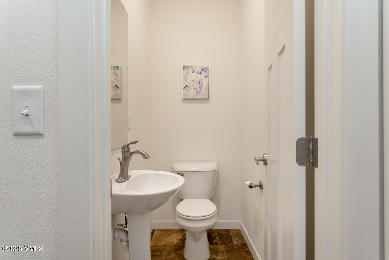 4 Uneva Court, Unit B1 Eagle, CO 81631 - Photo 13 of 44 a bathroom with a toilet sink and a mirror