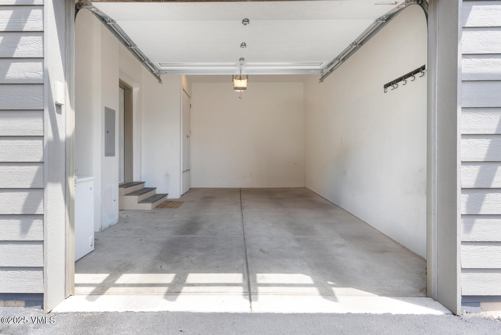 4 Uneva Court, Unit B1 Eagle, CO 81631 - Photo 26 of 44 a view of a hallway with wooden floor and entryway