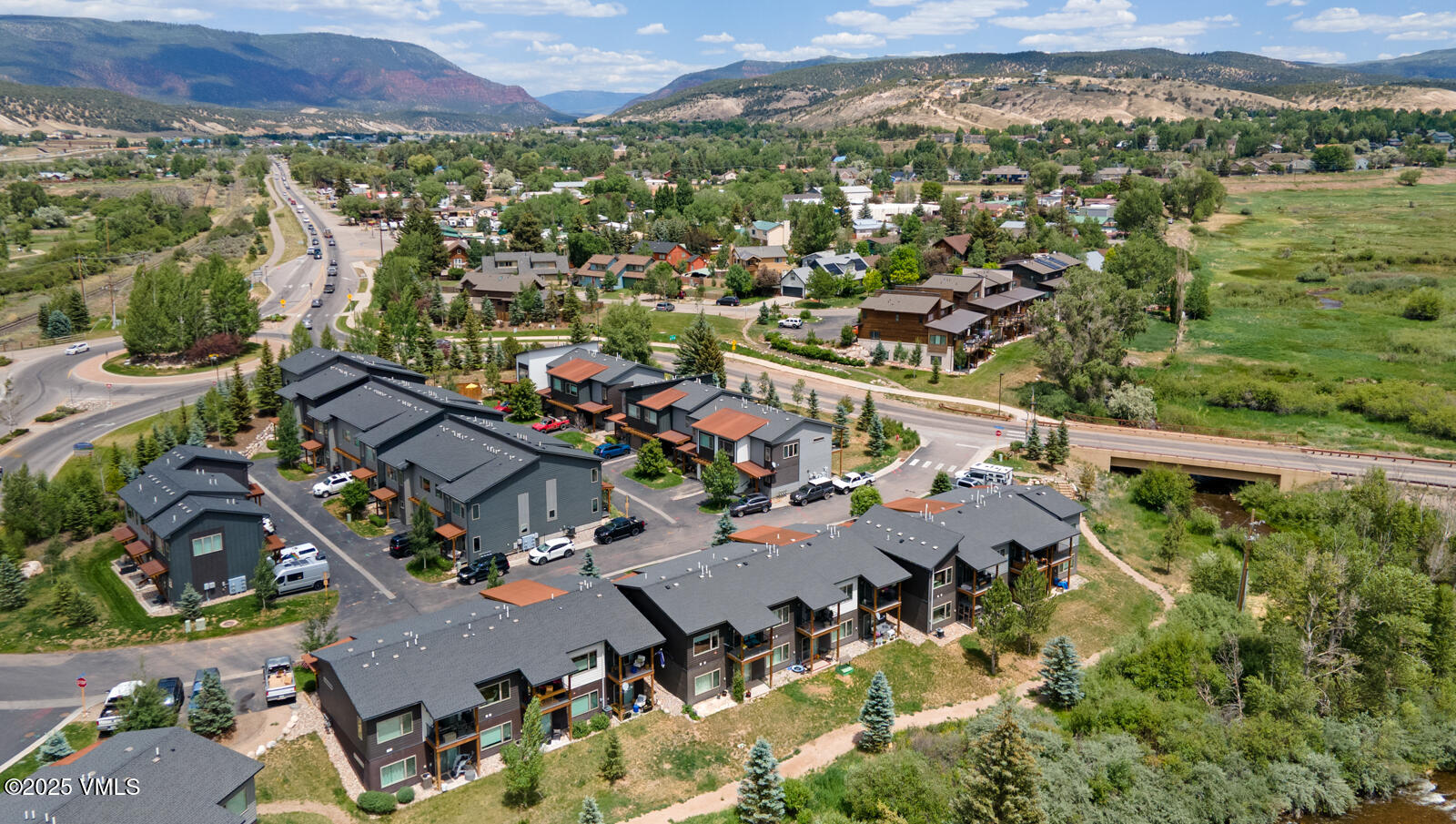 4 Uneva Court, Unit B1 Eagle, CO 81631 - Photo 38 of 44 an aerial view of residential houses with outdoor space
