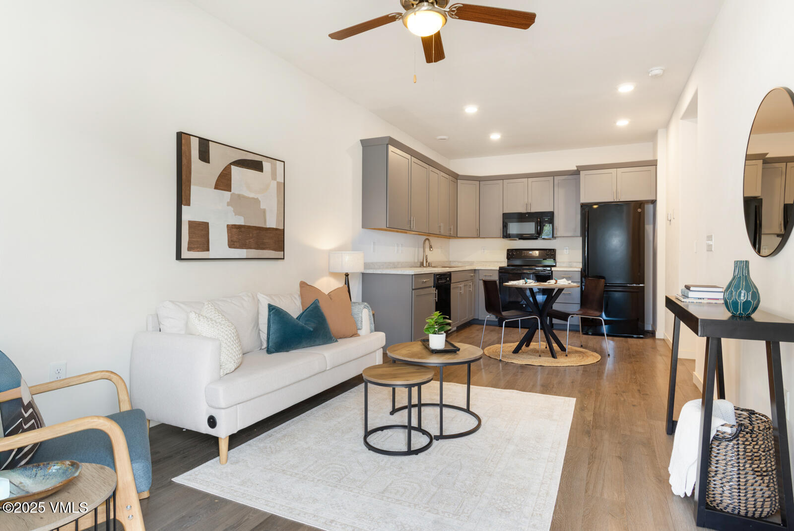 4 Uneva Court, Unit B1 Eagle, CO 81631 - Photo 4 of 44 a living room with furniture and a flat screen tv