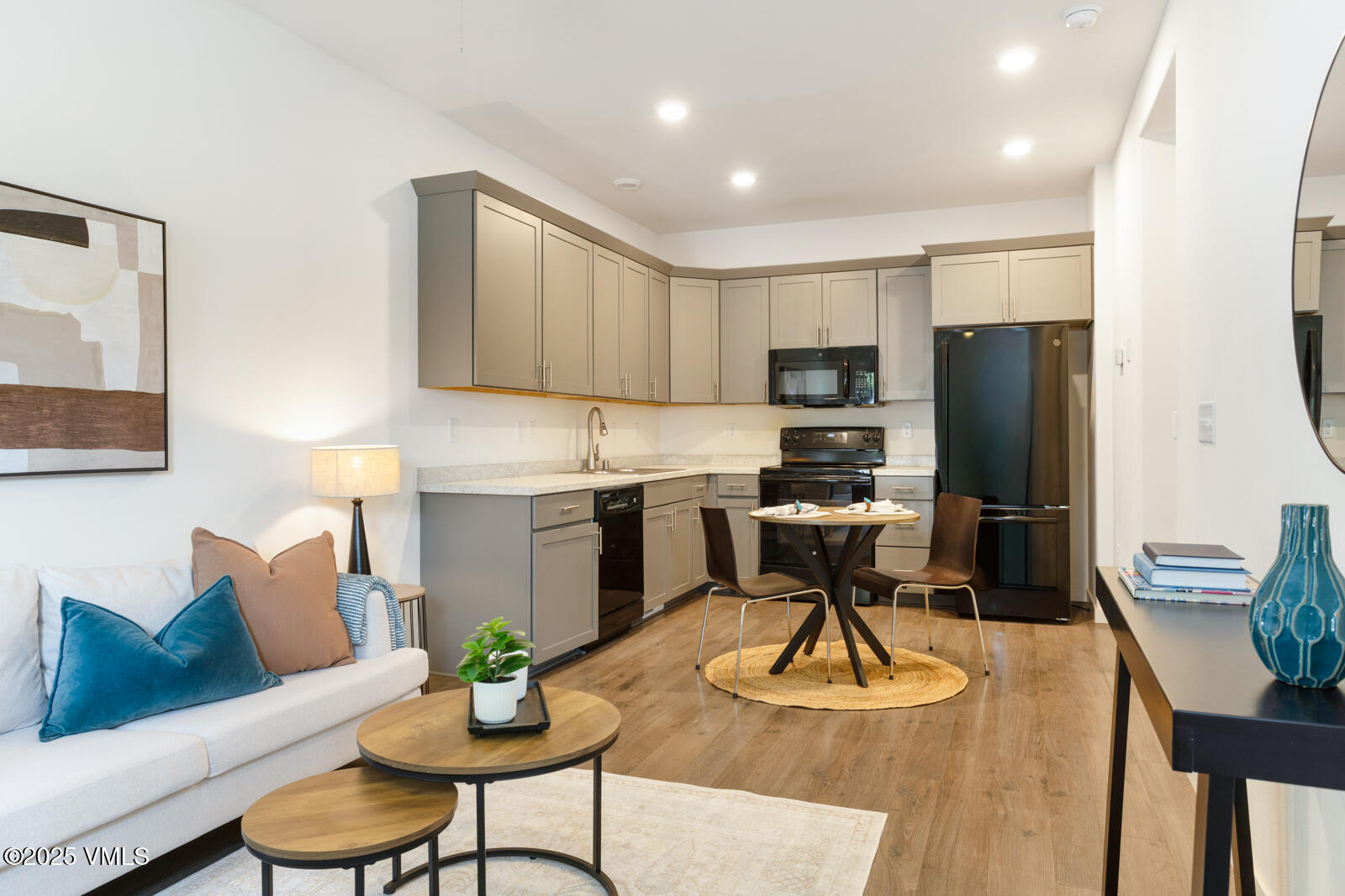 4 Uneva Court, Unit B1 Eagle, CO 81631 - Photo 5 of 44 a living room with furniture and kitchen view