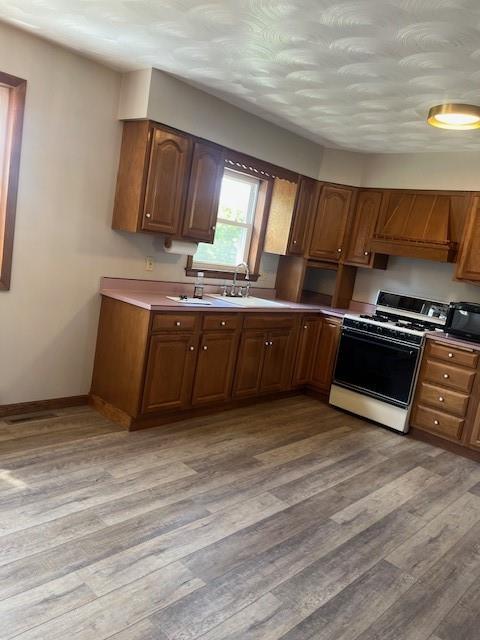 215 Yasenosky Road Smithfield, PA 15478 - Photo 6 of 19 a view of kitchen with wooden floor and electronic appliances