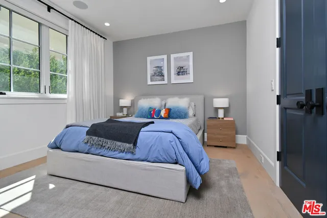 a media room with lots of chairs and a projector screen