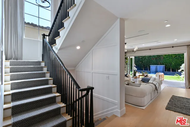 a bed room with bed and window