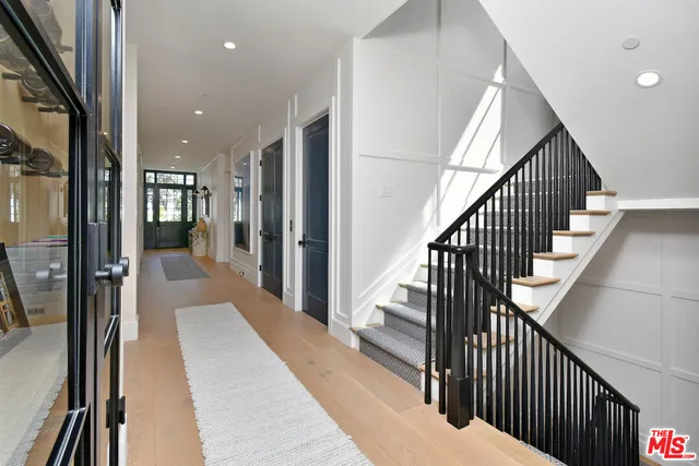 a bedroom with a bed and a fireplace