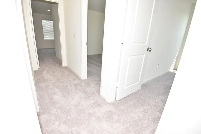 a view of a livingroom with wooden floor
