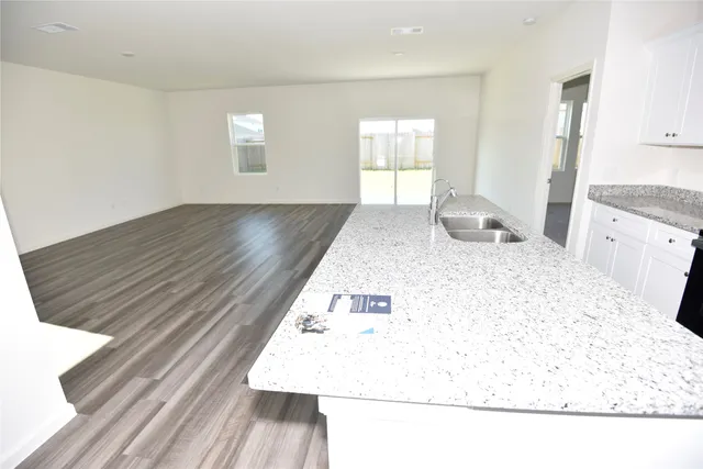 a living room with a bed