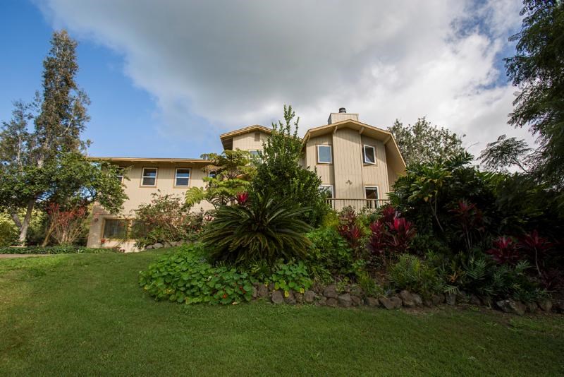 500 Aulii Drive Makawao, HI 96768 - Photo 1 of 27 a front view of a house with garden